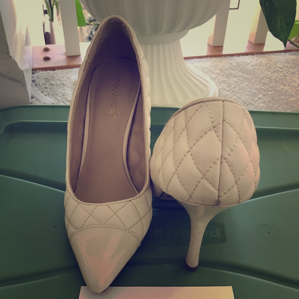 White quilted pumps