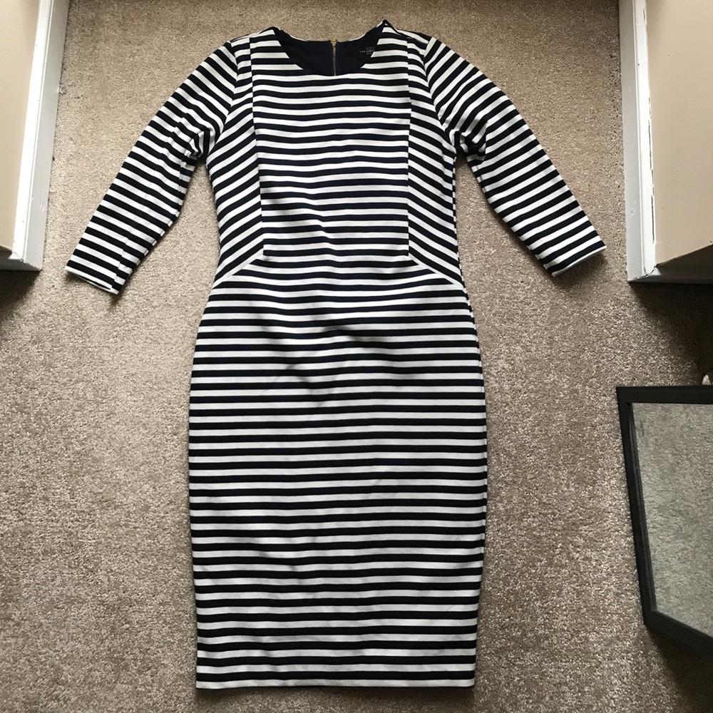The limited navy striped dress
