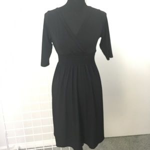 Black dress with gathered waist, knee length