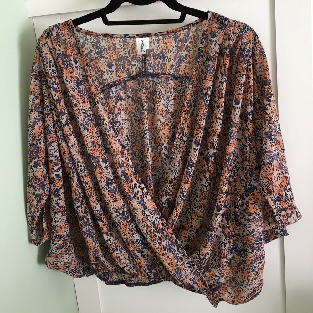 Fun loose fitting purple, orange and black shirt