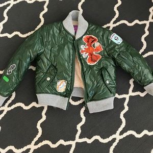 Custo Bomber jacket with embroidered patches. 4T