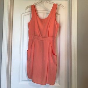 Peach silky mini dress with pockets.