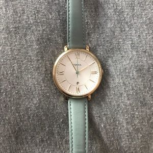Women’s Fossil brand watch.