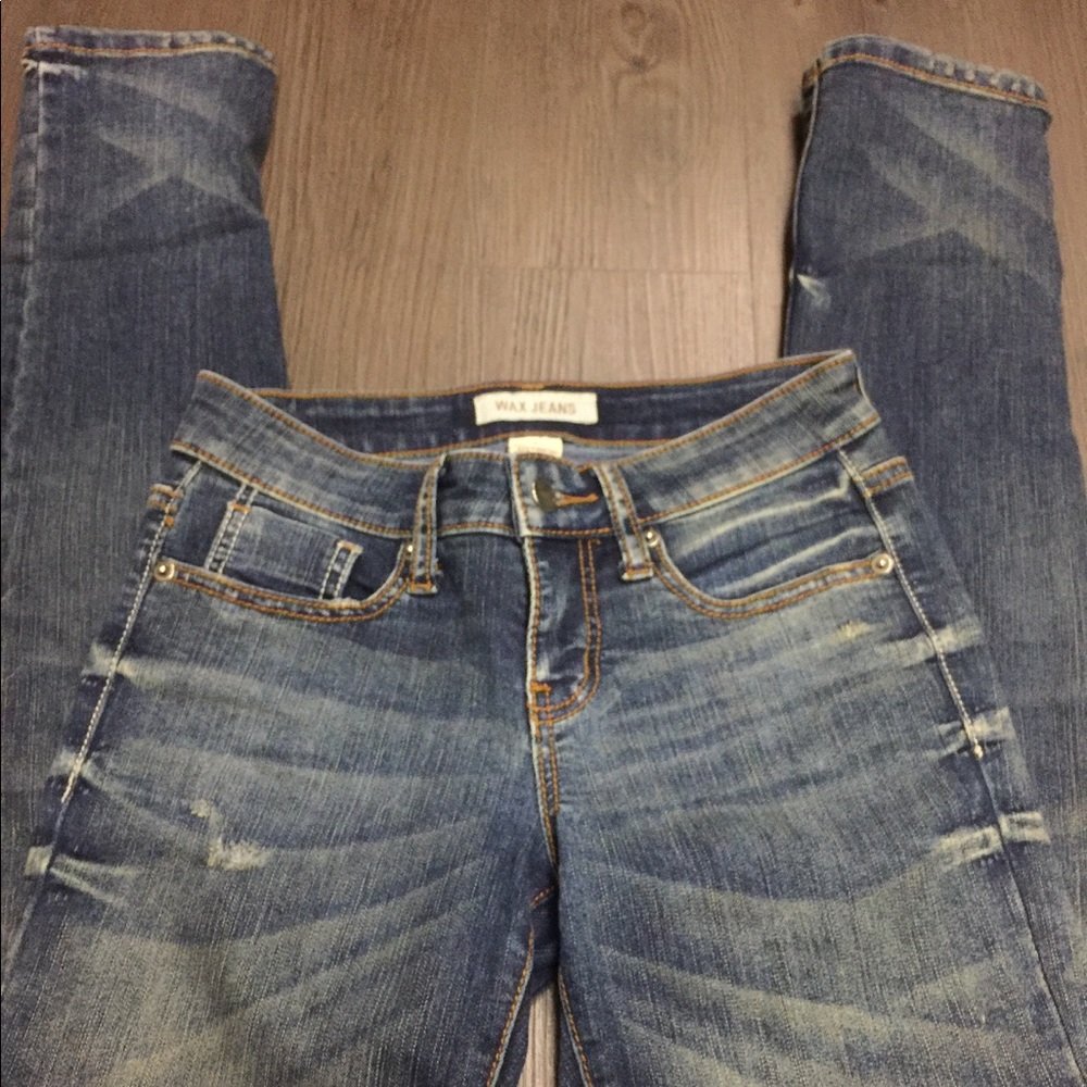 Dark wash distressed skinny denim jeans