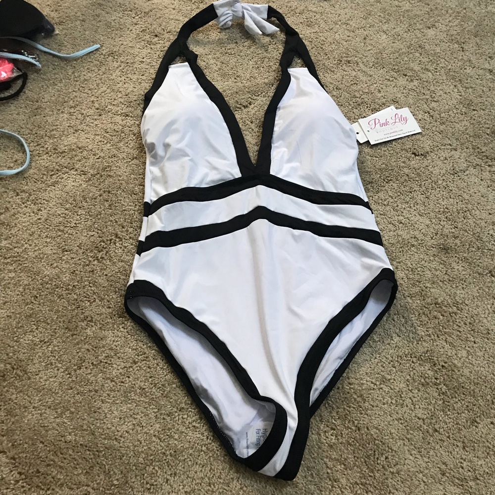 Pink Lily Boutique one piece swim suit. New