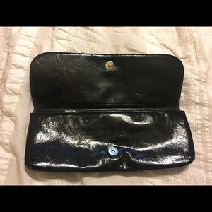 Plain black clutch