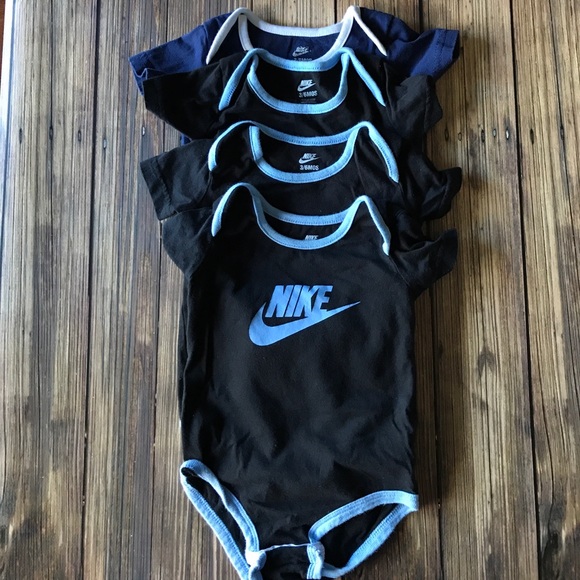 white nike baby onesie