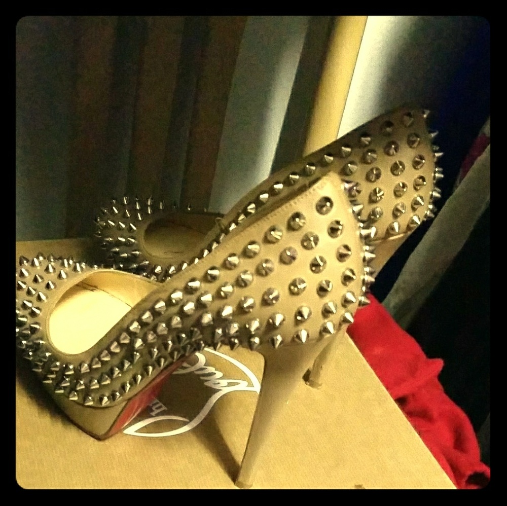 Spiked Louboutin biancas