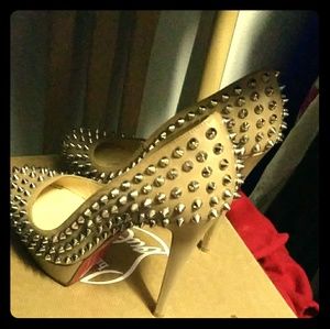 Spiked Louboutin biancas