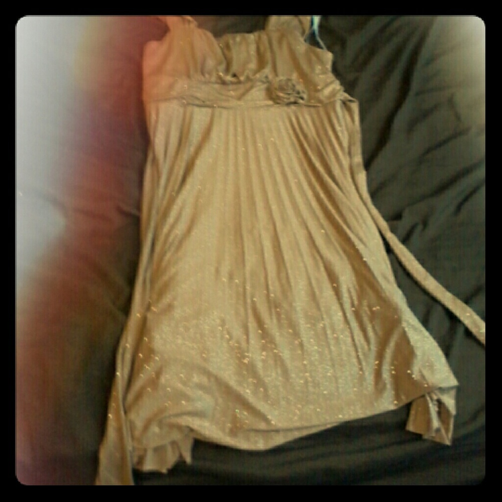 A gold sparkly dress