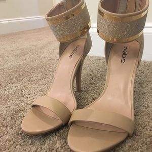 Beautiful Bebe nude and sparkly gold heels.