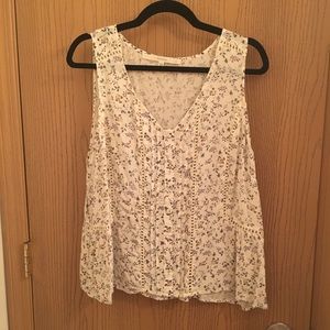 White floral sleeveless blouse