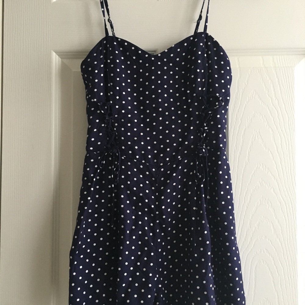 Navy polka dot romper
