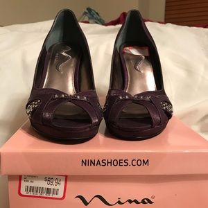 Never Worn Size 9 deep purple high heels