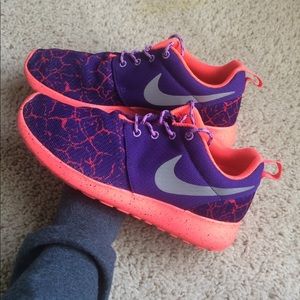 Hot coral pink and purple Nike Roches