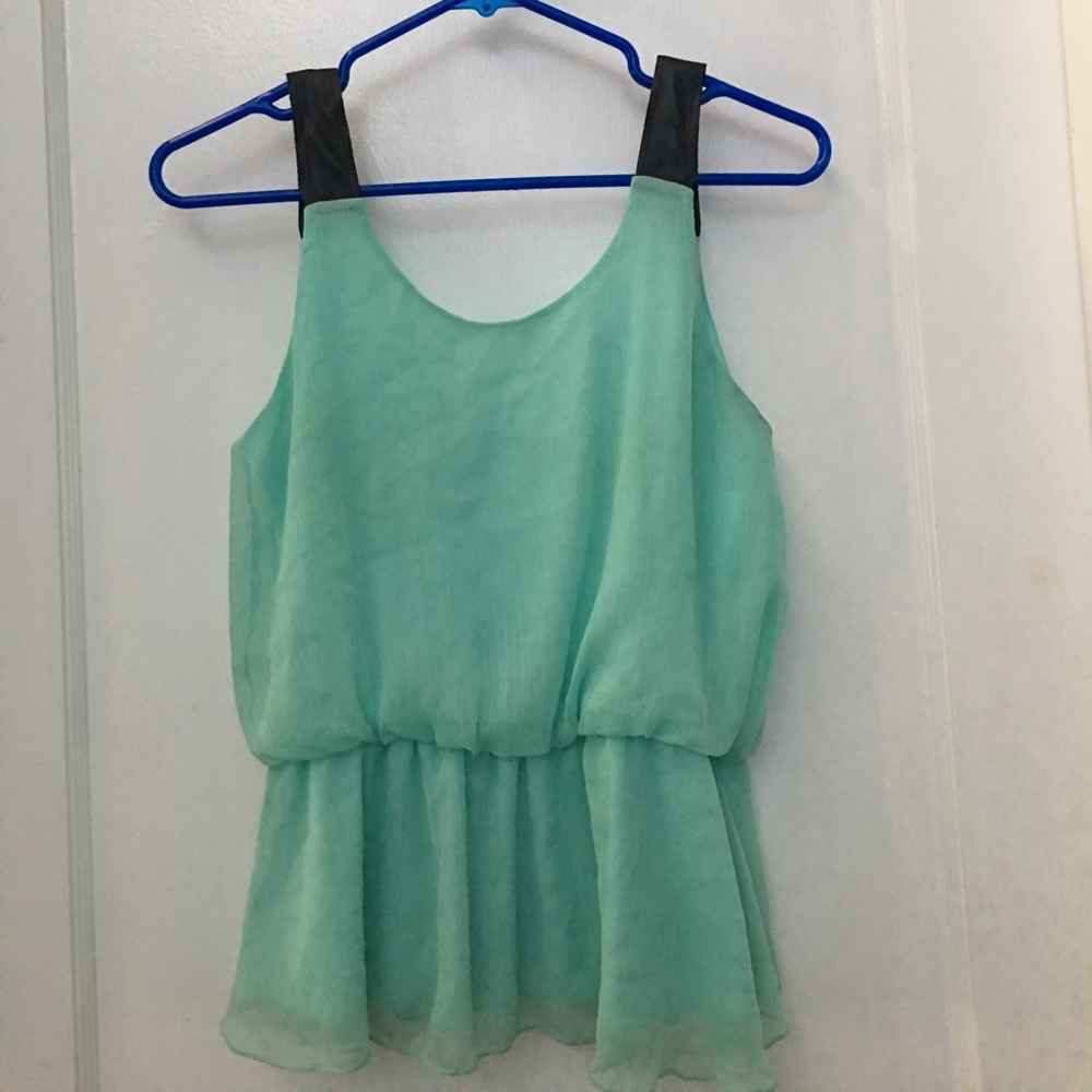 Teal open back top with black straps