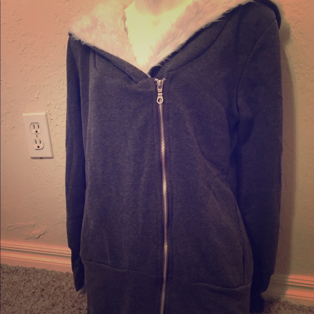 Fuzzy zip up hooded sweater.