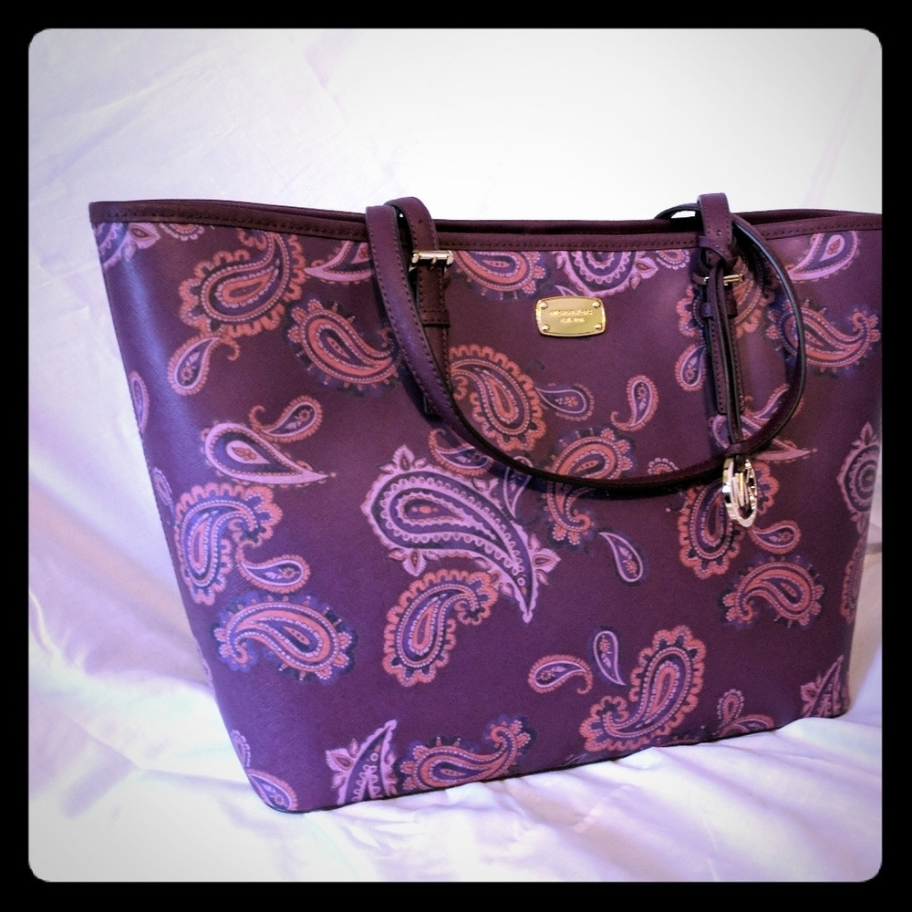 Brand new Michael Kors plum paisley hand bag