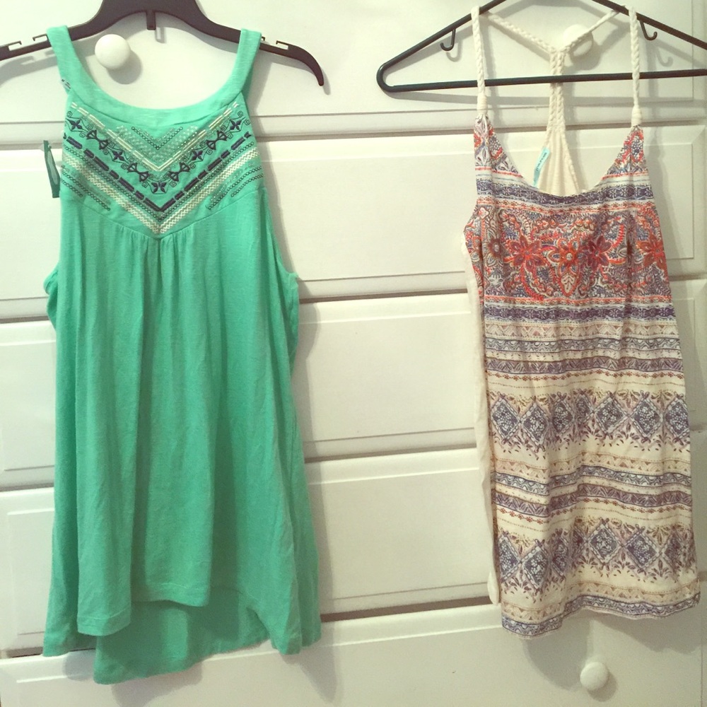2 Maurice’s tank tops