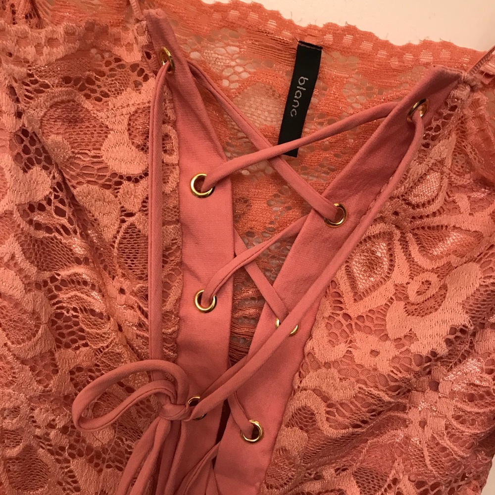 Pink Lace bodysuit.