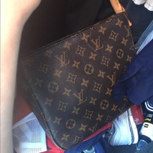 Louis Vutton small handbag good condition.