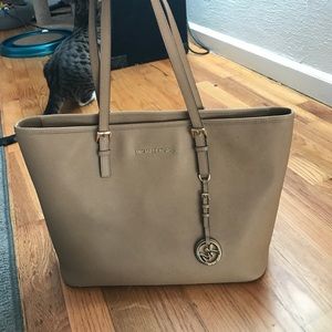 Tan Michael Kors purse! Roomy and cute!!!