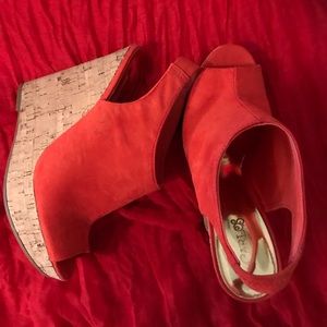 Orange cork screw wedge heel by Carlos Santana