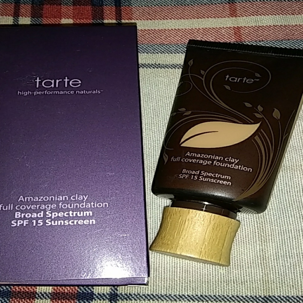 New foundation in color medium tan honey