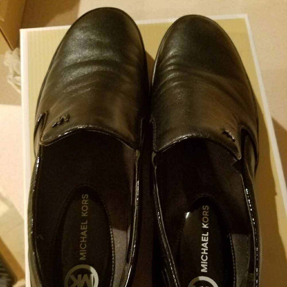 Black leather slip ons