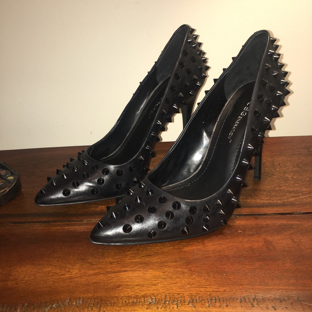 BCBGeneration spike leather pumps.