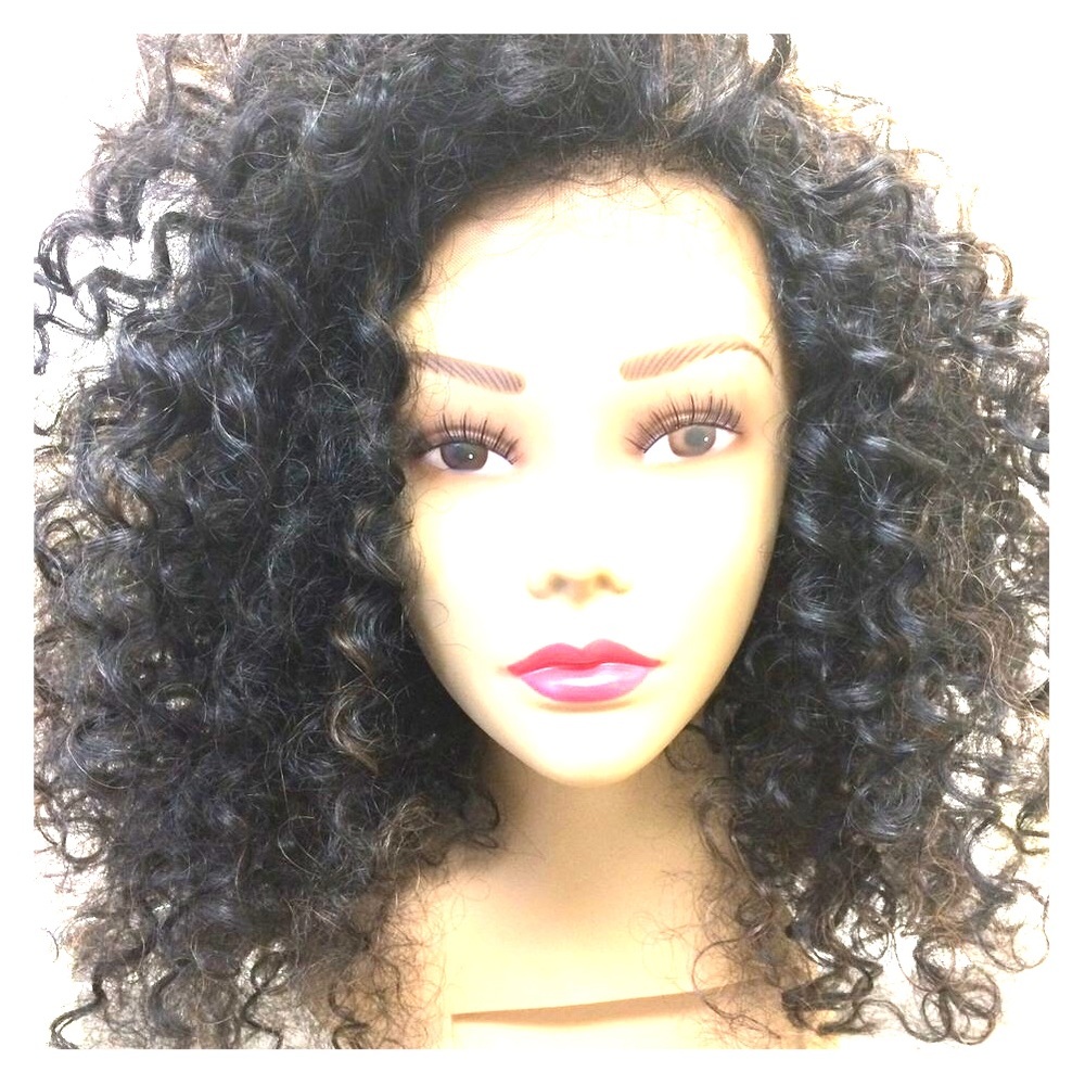 It’s a wig Lace front Synthetic Curly WiG