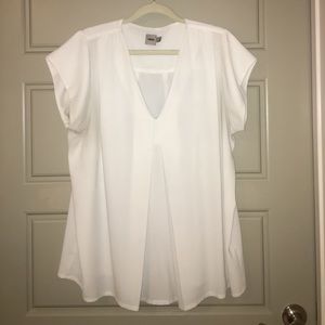 White V-neck top