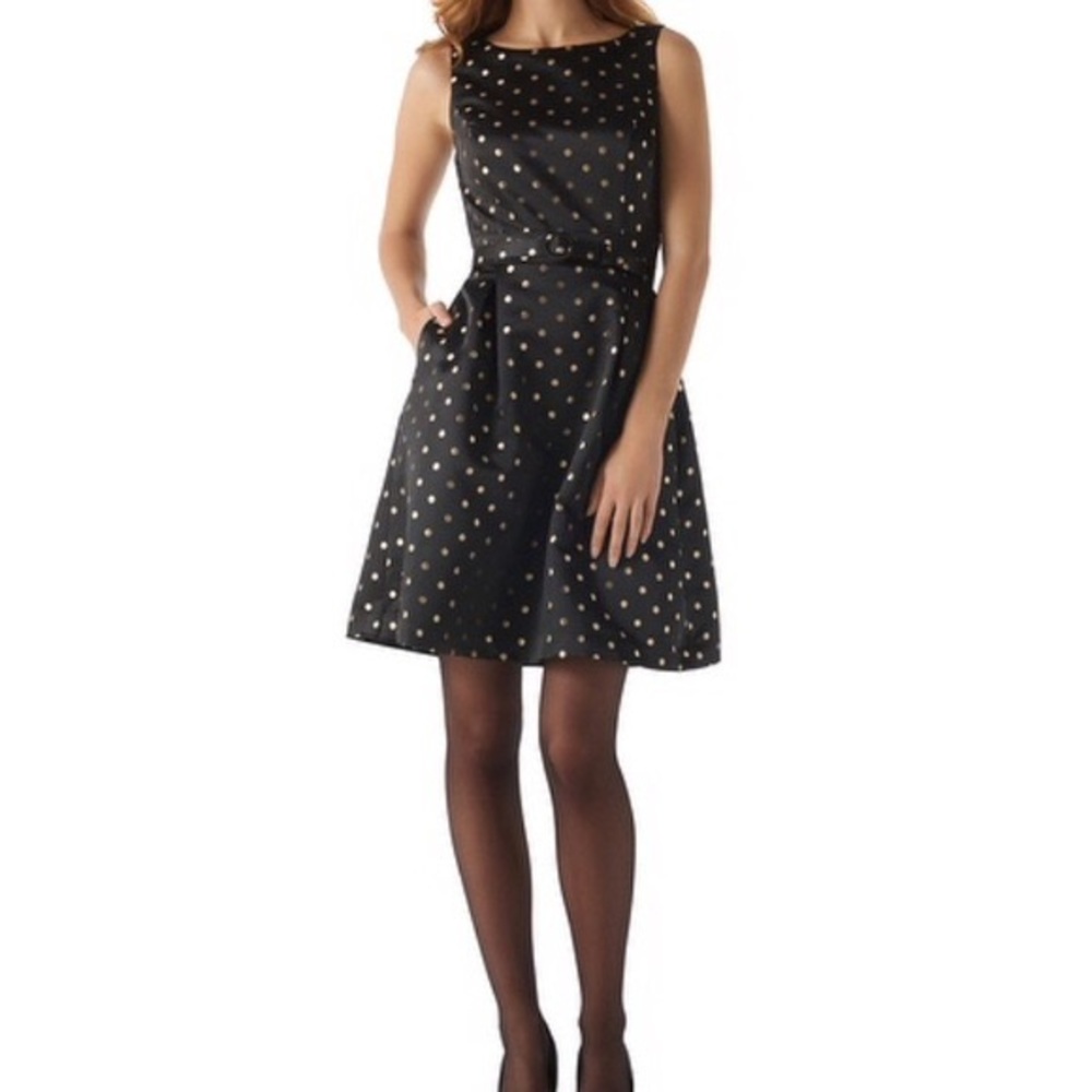 Elegant black dress with gold polka dots