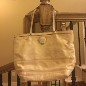 Coach purse with brown marks