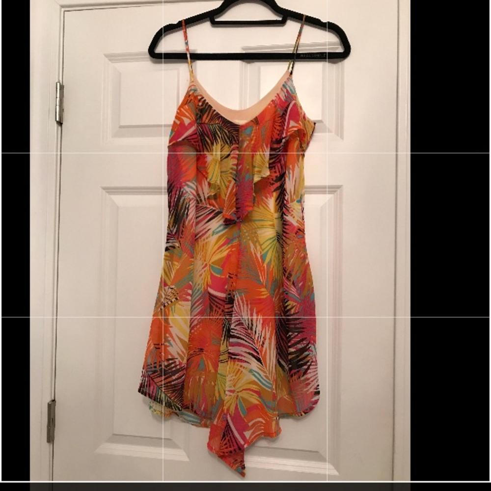 Dress or long shirt, cute over white pants