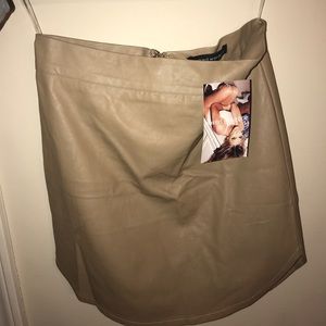 Naked wardrobe leather tan zip up miniskirt