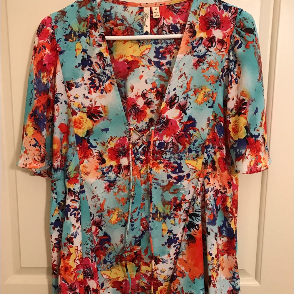 Boutique top with lace up detail and floral