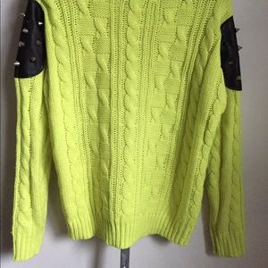 Edgy bright sweater with spike shoulders. 😈