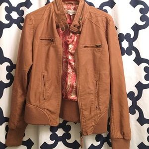 Camel color faux leather jacket.