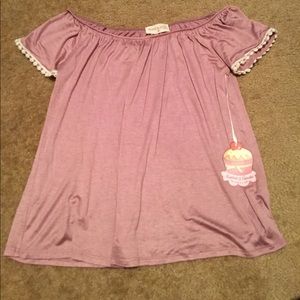 Flowy pink top with lace trim