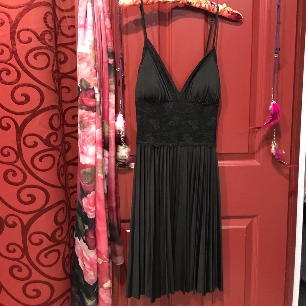Little black dress with lace and pleats