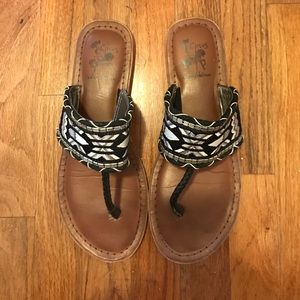 Black and white embellished flip flop sandals