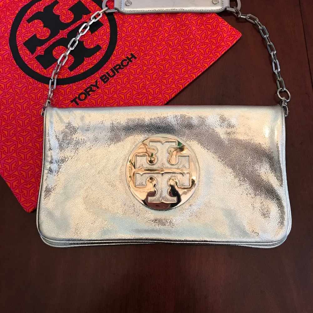 Tory Burch silver clutch or shoulder bag.