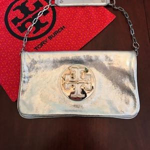 Tory Burch silver clutch or shoulder bag.