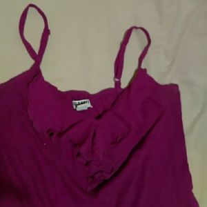Pinkish purple tank top with ruffles on chest