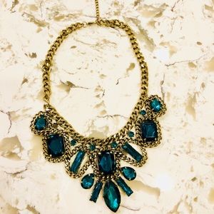 Emerald and gold necklace