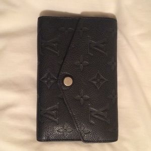 Louis Vuitton monogram empreinte curieuse trifold