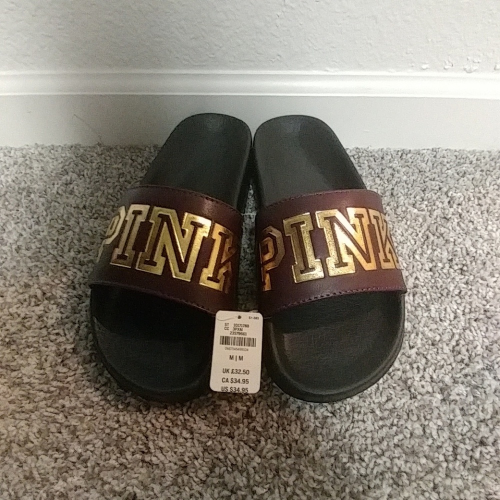 Pink brand slip ons