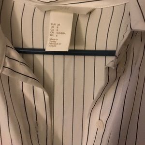 New HM oversized white with black strip Blouse
