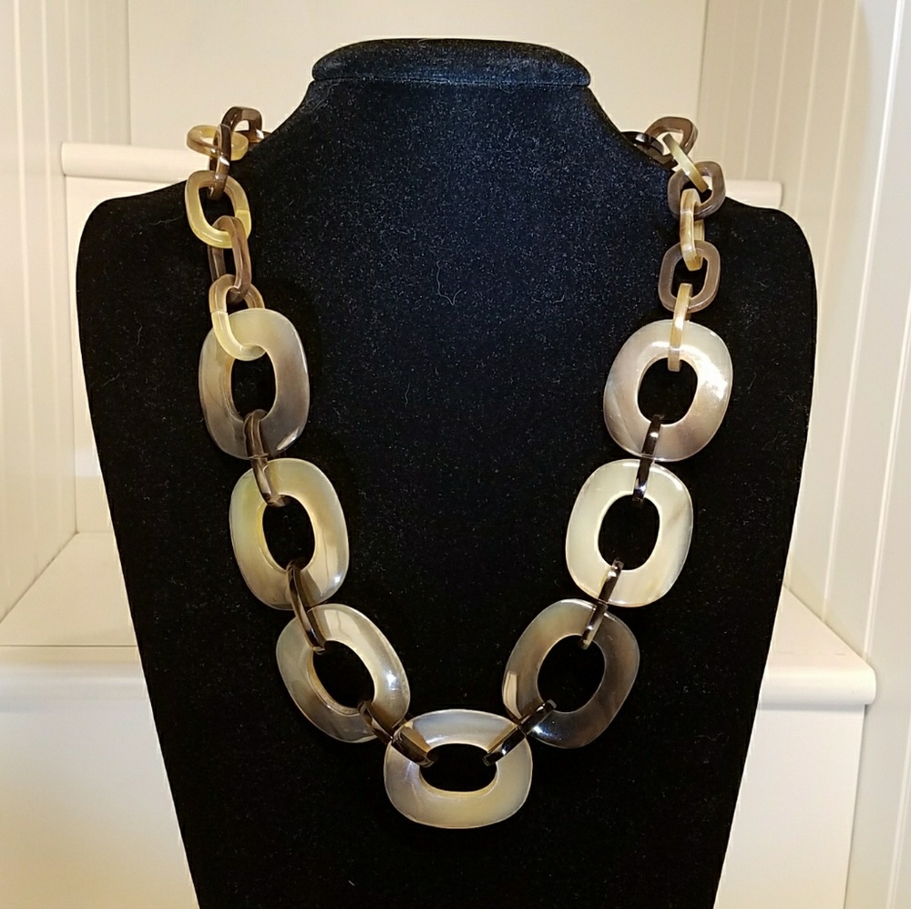 Buffalo horn necklace.